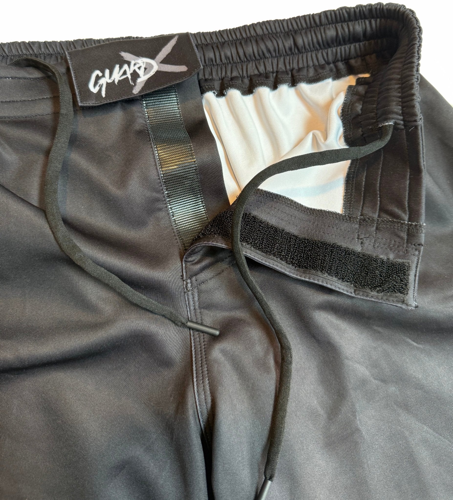 Close-up of Batik-X Pulse premium fight shorts closure, velcro waistband with drawstring for secure fit